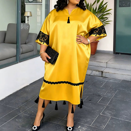 Damen elegantes Kaftankleid mit raffinierten Spitzenärmel und dekorativen Quasten Echo Archiv