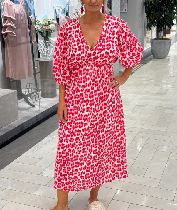 Damen nan Maxikleid mit tiefem V-Ausschnitt, voluminösen Puffärmeln und smockierter Taillennaht Echo Archiv