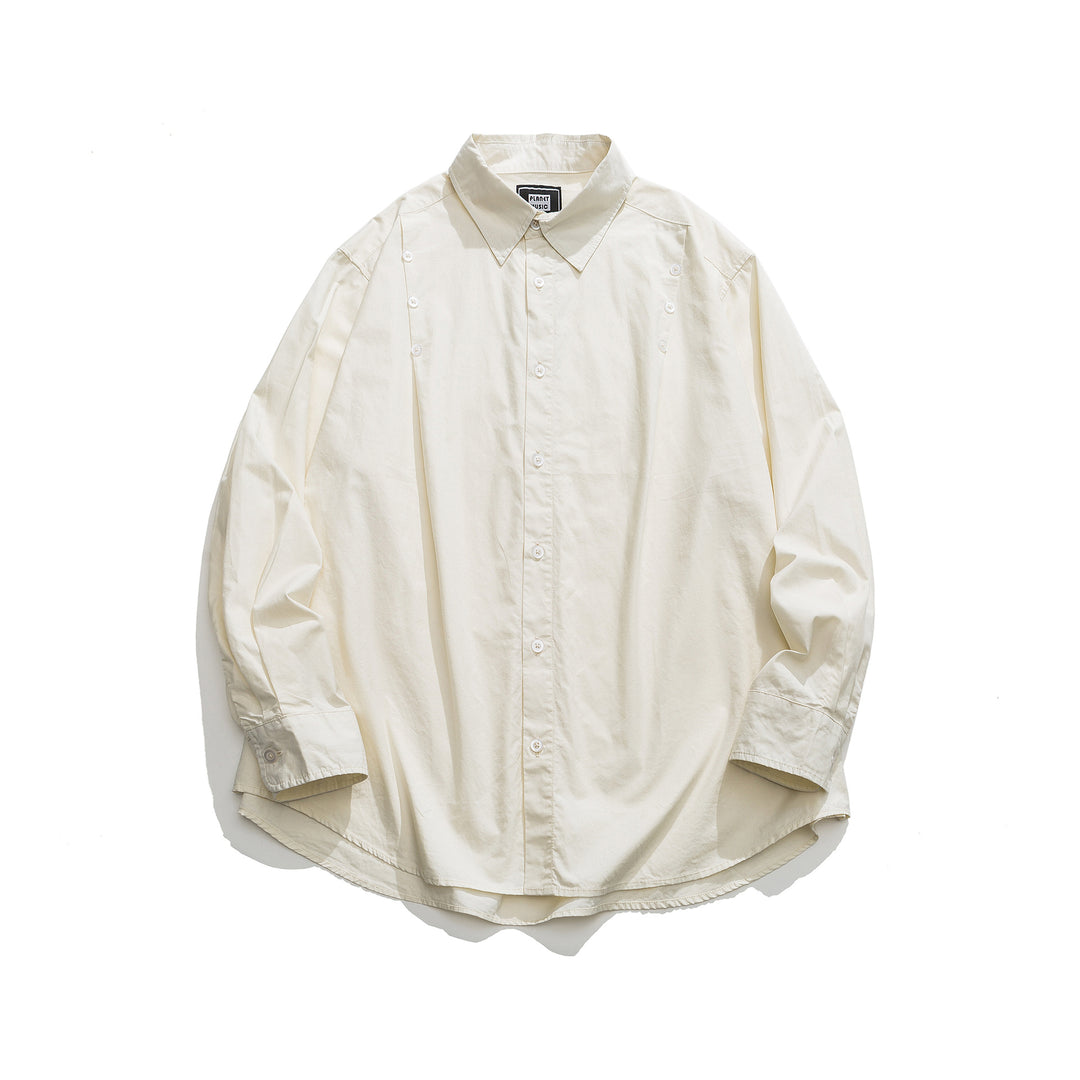 Unisex Oversized Hemdjacke mit seitlichen Zierknopfreihen und gerundetem Saum Echoarchiv