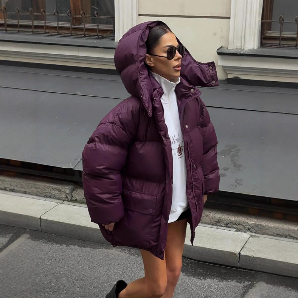 Damen Oversize Steppjacke mit Kapuze und wattierter Thermofütterung Echoarchiv