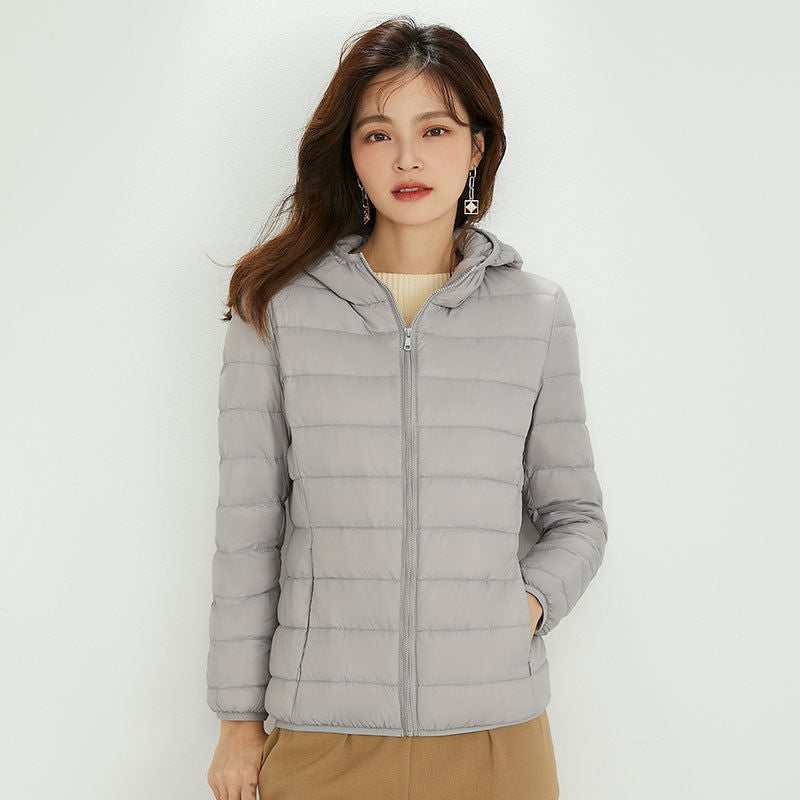 Damen Ultraleichte gesteppte Kapuzenjacke mit ultraflacher Thermowatte Echoarchiv