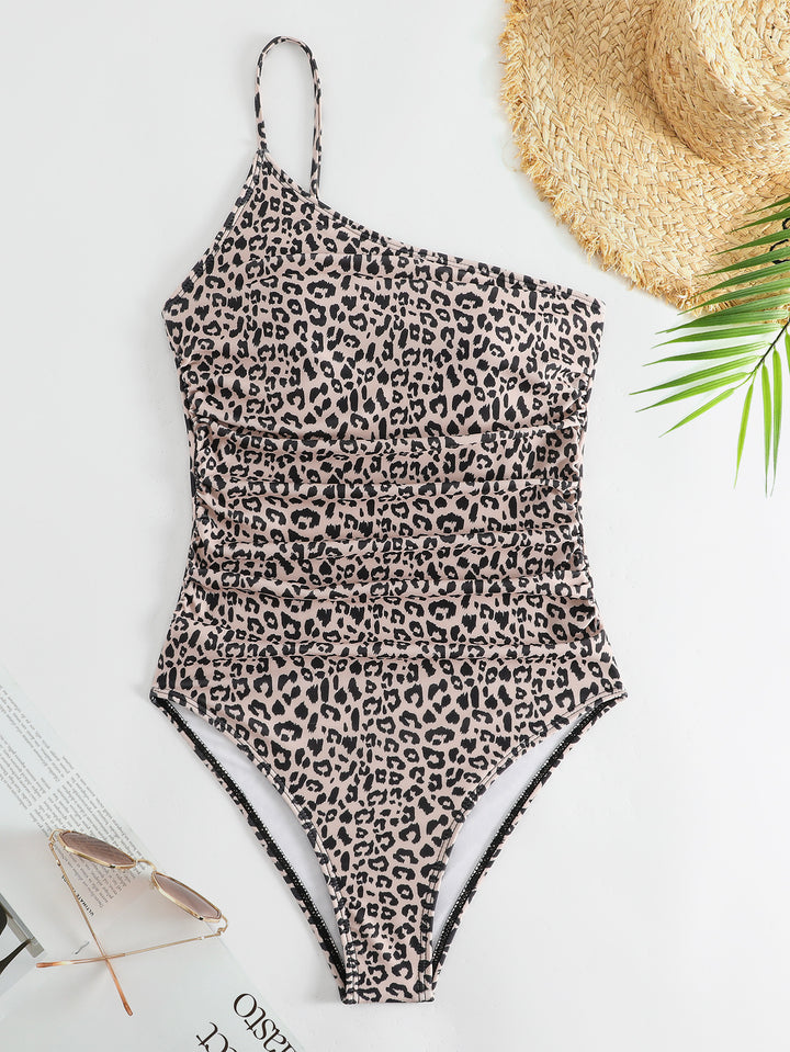 Damen One-Shoulder Badeanzug mit stylischem Animal-Print und femininen Raffungen Echo Archiv