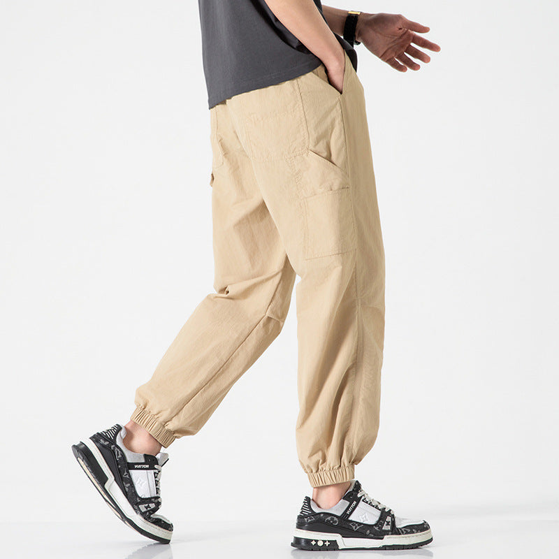 Herren Nylon-Mix Relaxed-Jogger mit elastischem Komfortbund, verdeckten Reißverschlusstaschen und geripptem Knöchelabschluss Echo Archiv