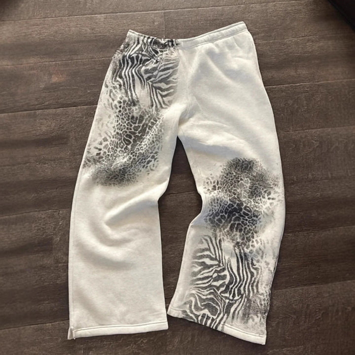 Damen nan lockere Sweathose mit asymmetrischem Animal-Print, elastischem Komfortbund und geradem Bein Echo Archiv