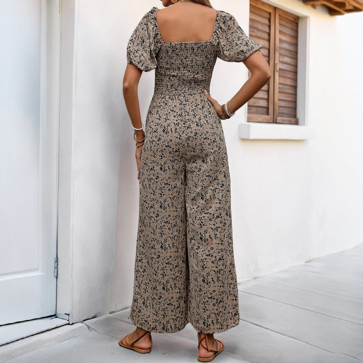 Damen Floraler Smocked-Jumpsuit mit Karree-Ausschnitt, Puffärmeln und weitem Beinschnitt Echoarchiv