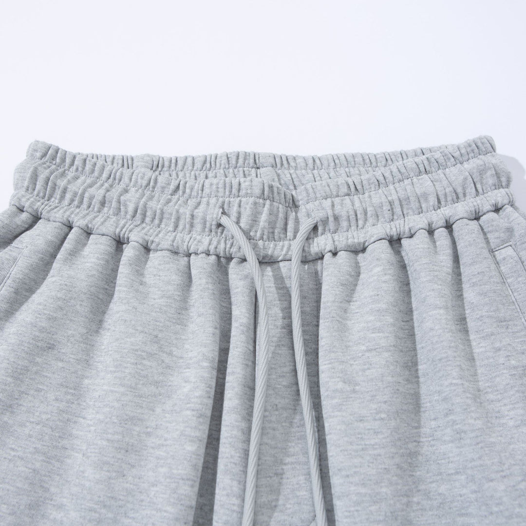 Unisex Weite French‑Terry Sweatpant mit elastischem Tunnelzugbund, Seitentaschen und verstellbarem Saum Echoarchiv