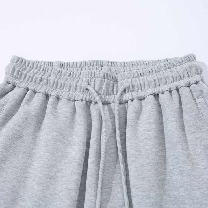 Unisex Weite French‑Terry Sweatpant mit elastischem Tunnelzugbund, Seitentaschen und verstellbarem Saum Echoarchiv