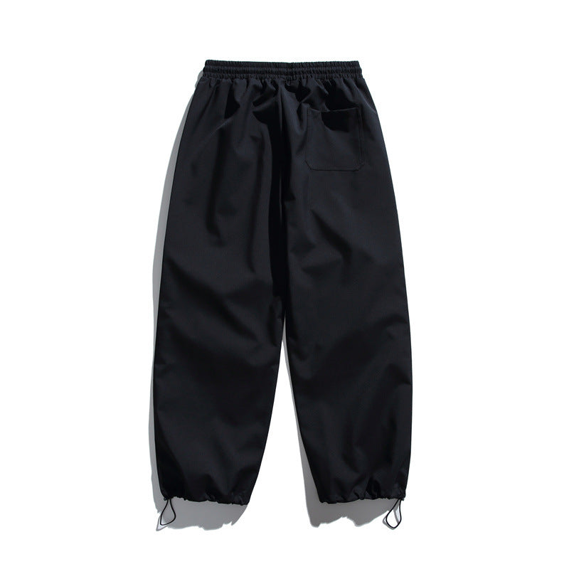 Unisex Technische Cargo-Joggerhose mit elastischem Bund, Reißverschlusstasche und Kordelzug Echoarchiv