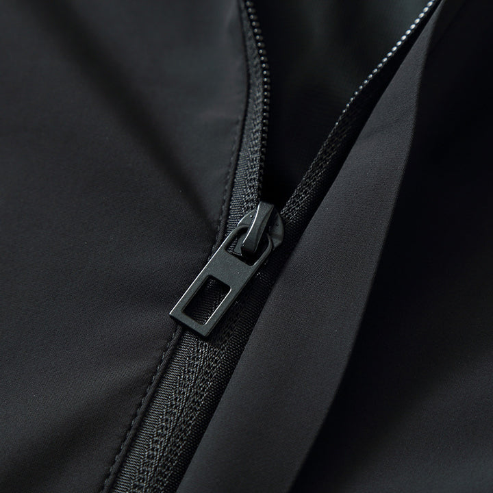 Herren Funktionale Slim‑Softshell‑Kapuzenjacke mit wasserabweisender Beschichtung und elastischen Bündchen Echo Archiv