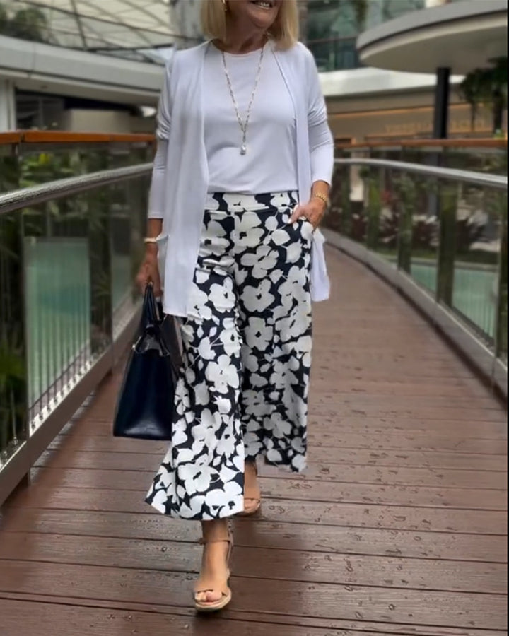 Damen nan weite Palazzohose mit großblumigem Print, hohem Bund und Eingrifftaschen Echo Archiv