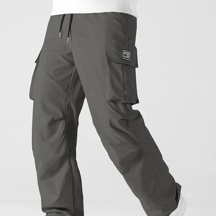 Herren Relaxed Cargo-Hose mit Tunnelzugbund, großen Klapp‑Utilitytaschen und geradem Bein Echo Archiv