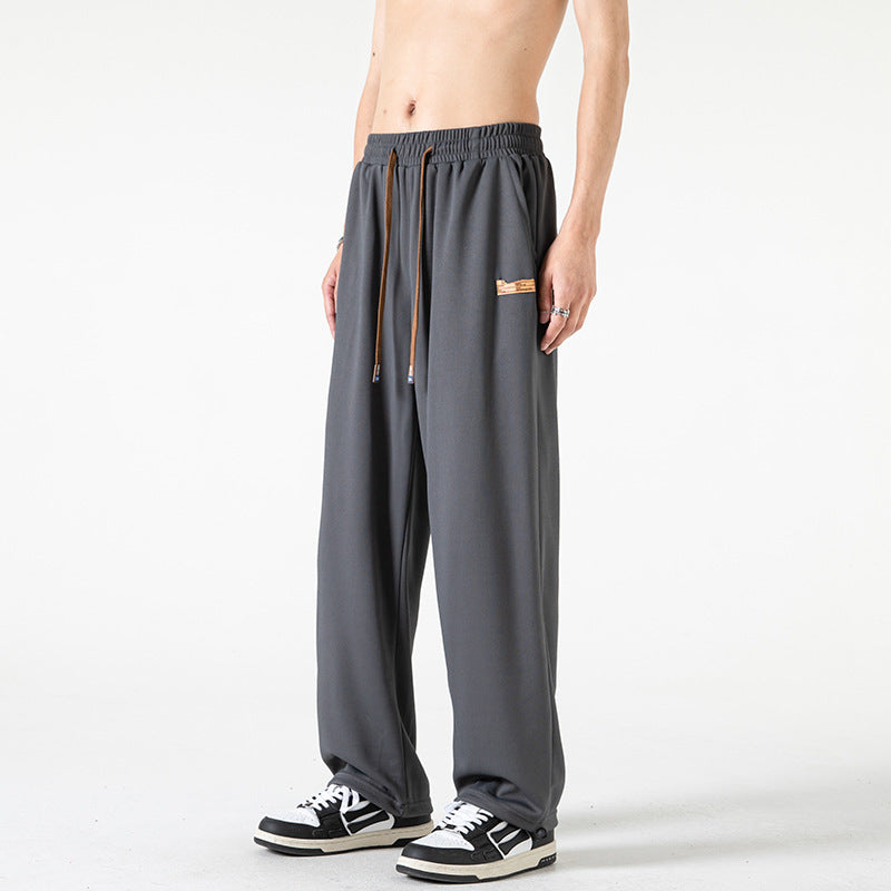Herren Lounge-Jogginghose im Oversize-Straßenstil mit extra weitem Bein und Kordelzug Echo Archiv