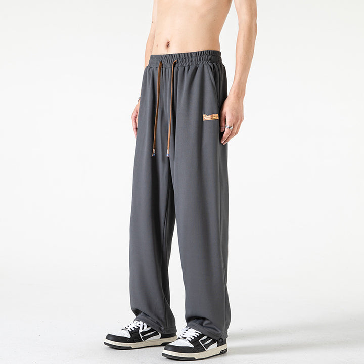 Herren Lounge-Jogginghose im Oversize-Straßenstil mit extra weitem Bein und Kordelzug Echo Archiv