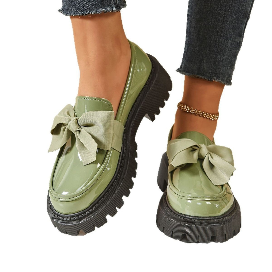 Damen Lack-Loafer mit markanter Profilsohle und Zierschleife Echoarchiv