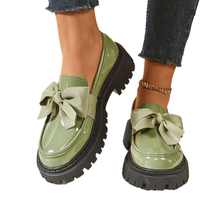 Damen Lack-Loafer mit markanter Profilsohle und Zierschleife Echoarchiv
