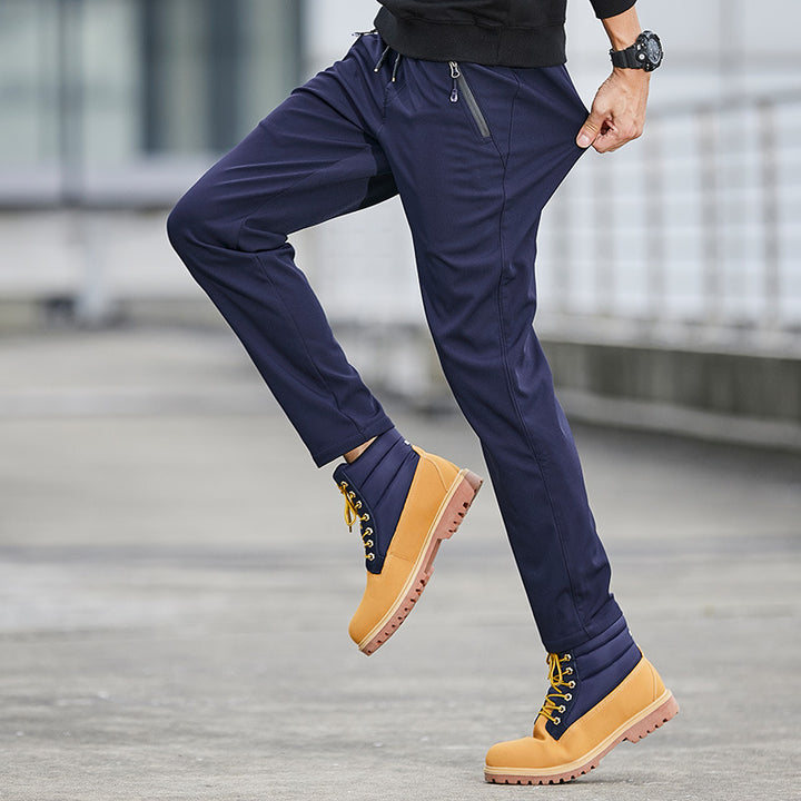 Herren Technische Softshell-Jogginghose mit wasserabweisender Membran, Reißverschlusstaschen und elastischem Kordelbund Echo Archiv