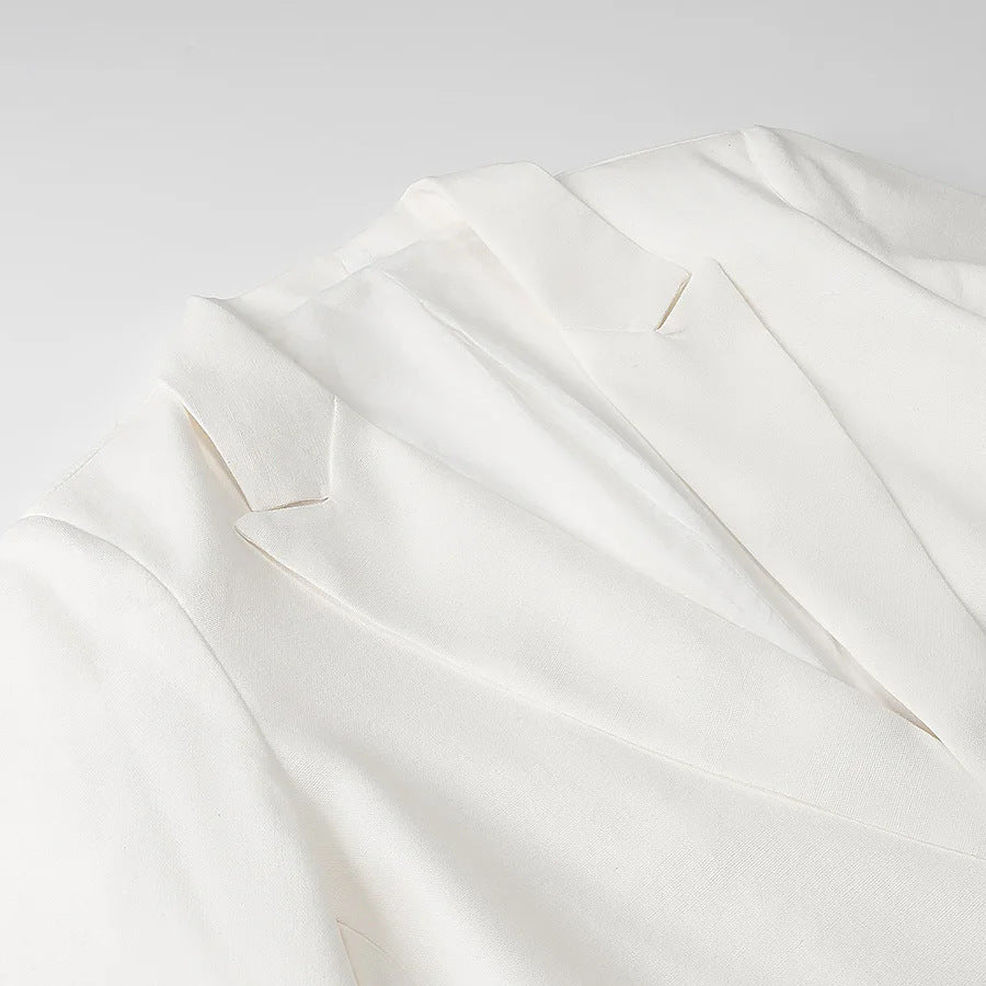 Damen unstrukturierter Longblazer mit fallendem Revers, leichter Stretchqualität und Pattentaschen – Célinea