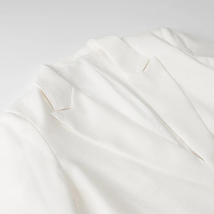 Damen unstrukturierter Longblazer mit fallendem Revers, leichter Stretchqualität und Pattentaschen – Célinea
