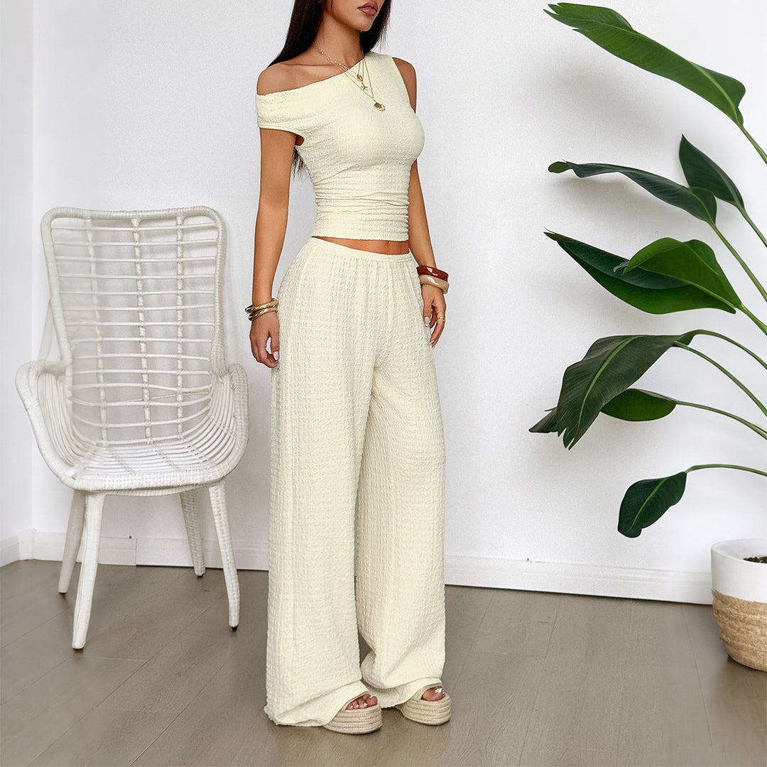 Damen Zweiteiliges Set aus elastischem Rippstoff mit asymmetrischem Top und weitem Hosen Echo Archiv