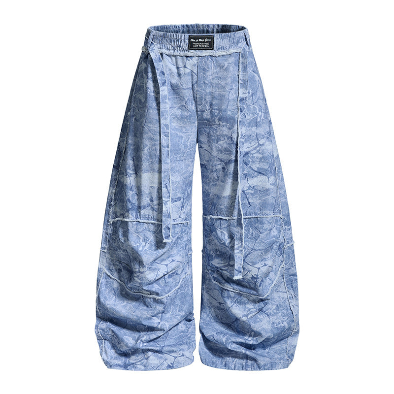 Damen weite Balloon-Jeanshose mit elastischem Bund, langen Zierbändern und Batik-Optik Echoarchiv