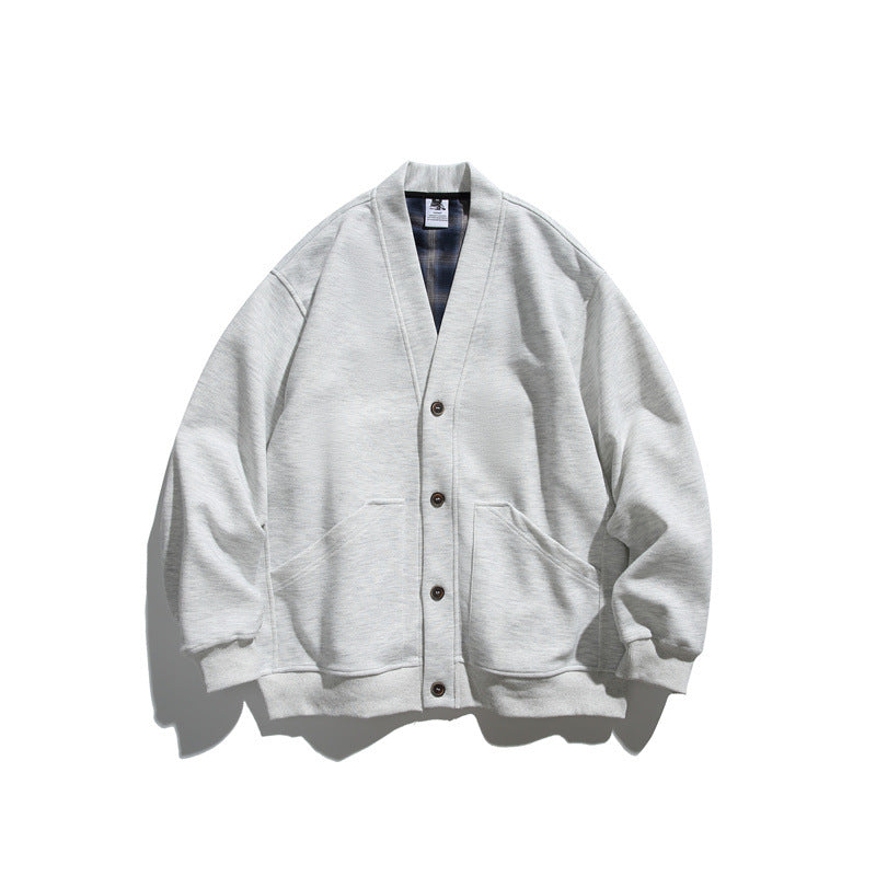 Unisex Oversize-Cardiganjacke aus schwerem French-Terry mit V-Ausschnitt und aufgesetzten Eingrifftaschen Echoarchiv