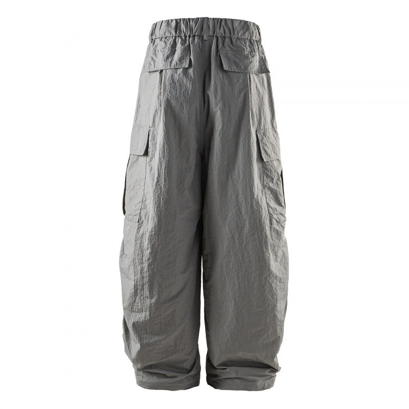 Unisex Weite Cropped Cargo-Hose mit elastischem Bund, Tunnelzug und aufgesetzten Taschen Echo Archiv