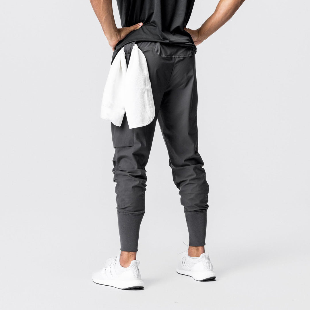 Herren Multifunktionale Sporthose mit seitlichen Reißverschlusstaschen und elastischem Bund Echoarchiv