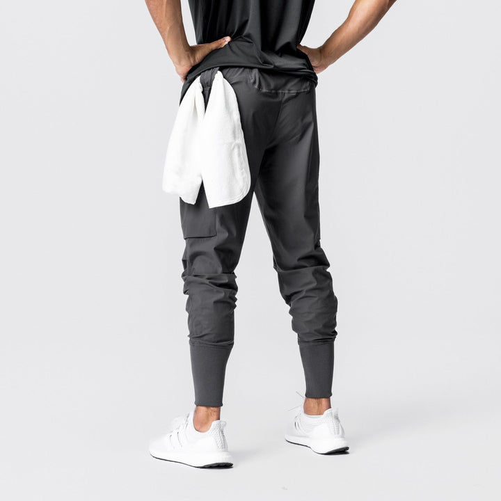 Herren Multifunktionale Sporthose mit seitlichen Reißverschlusstaschen und elastischem Bund Echoarchiv