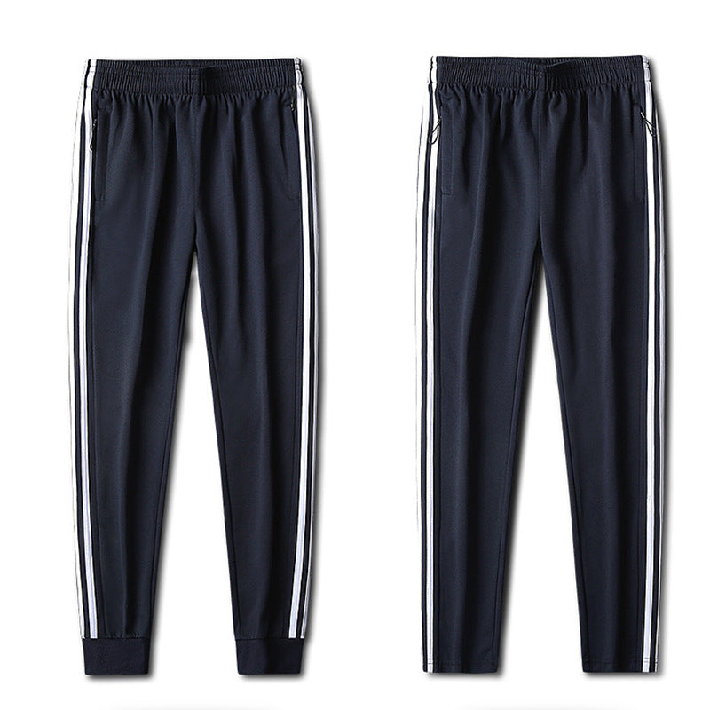 Herren Slim-Fit Trackhose mit seitlichen Kontraststreifen, Reißverschlusstaschen und elastischem Bund – Sorevano