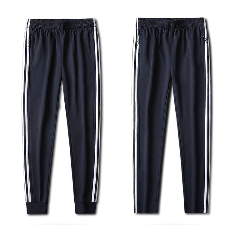 Herren Slim-Fit Trackhose mit seitlichen Kontraststreifen, Reißverschlusstaschen und elastischem Bund – Sorevano