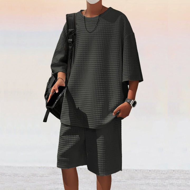 Herren lässiges Set aus atmungsaktivem Material mit strukturiertem Oberteil und Shorts Echoarchiv