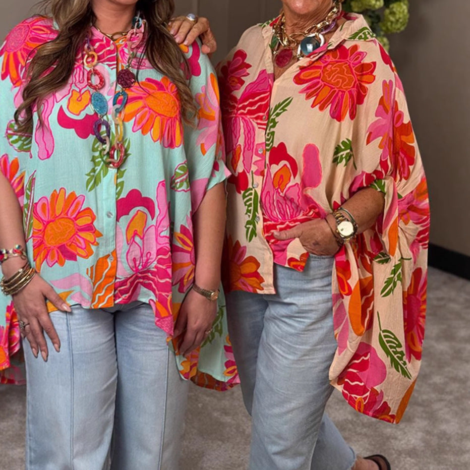 Damen nan luftige Oversize-Hemdbluse im Resortstil mit großflächigem Blumenprint und asymmetrischem Zipfelsaum Echo Archiv