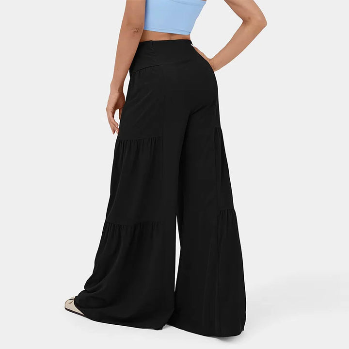 Damen weite Palazzo-Hose mit hoher Taille, bindbarem Taillenband und Stufensaum – Avérine