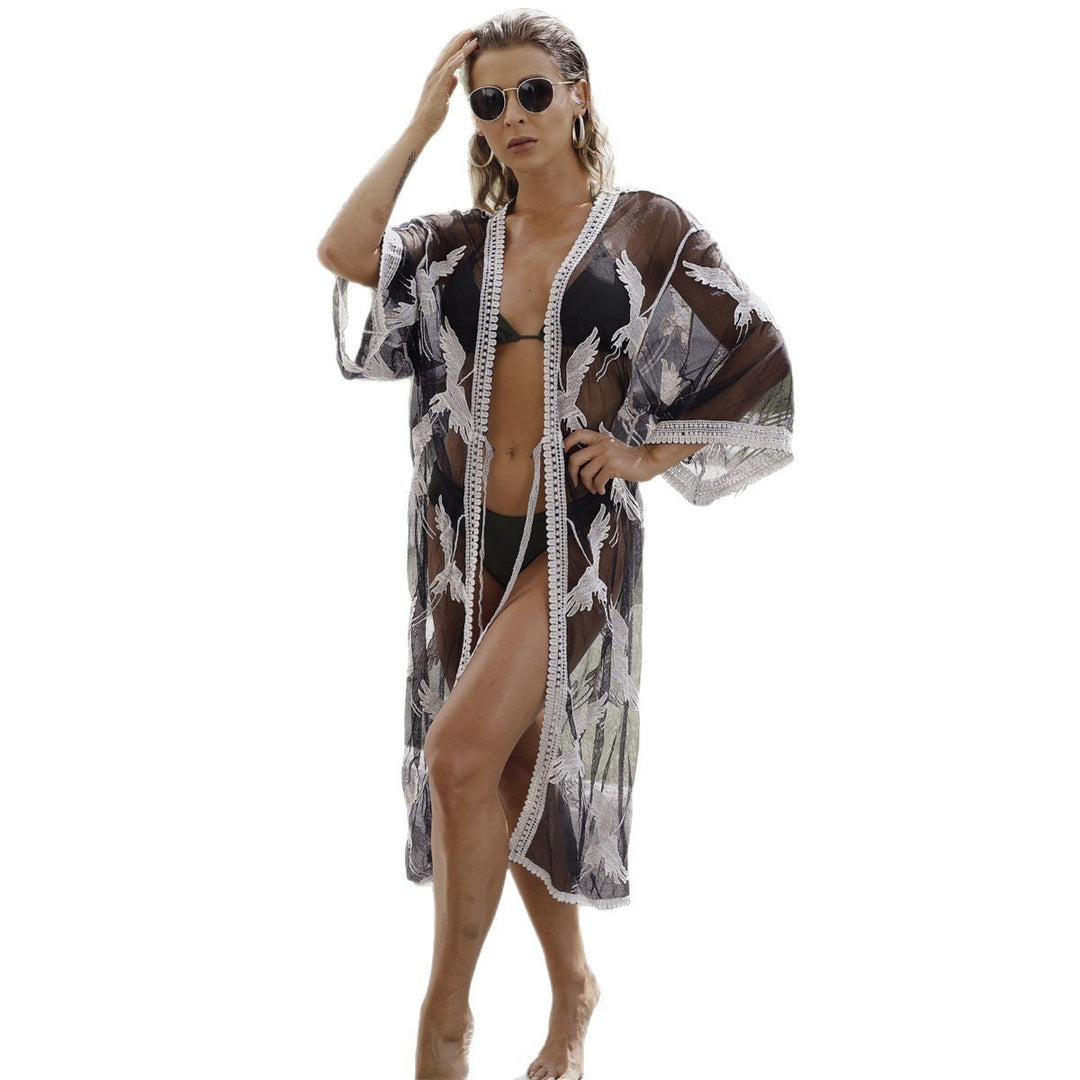 Damen eleganter Strandüberwurf mit floralem Muster und Bindegürtel Echo Archiv