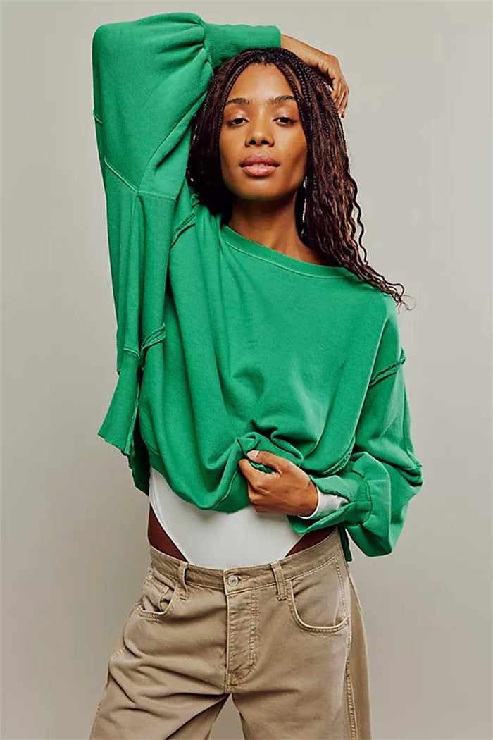 Damen oversized Sweatshirt mit Ballonärmeln, offenen Saumnähten und seitlichen Schlitzen – Avérine