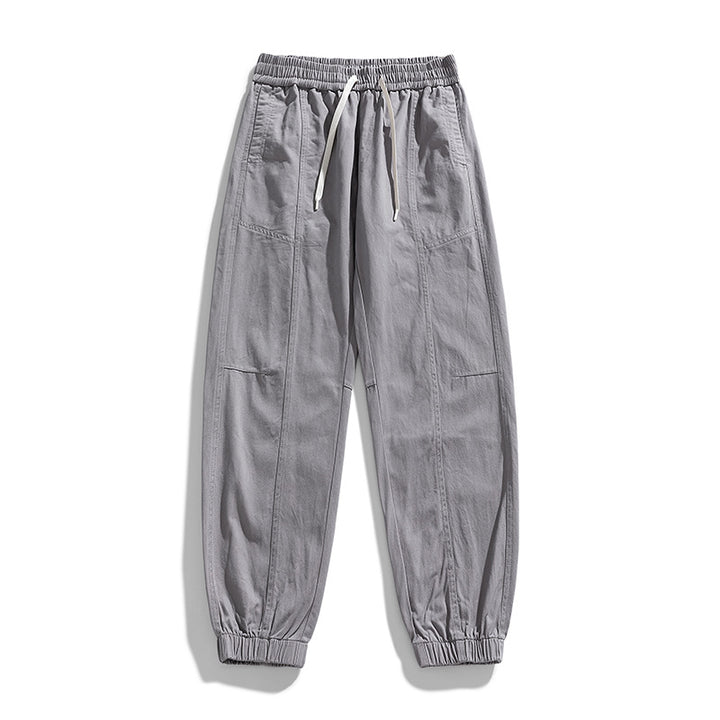 Herren Oversized Utility-Jogginghose aus robustem Baumwollmix mit Kordelbund, seitlichen Cargo‑Taschen & gerippten Bündchen Echoarchiv