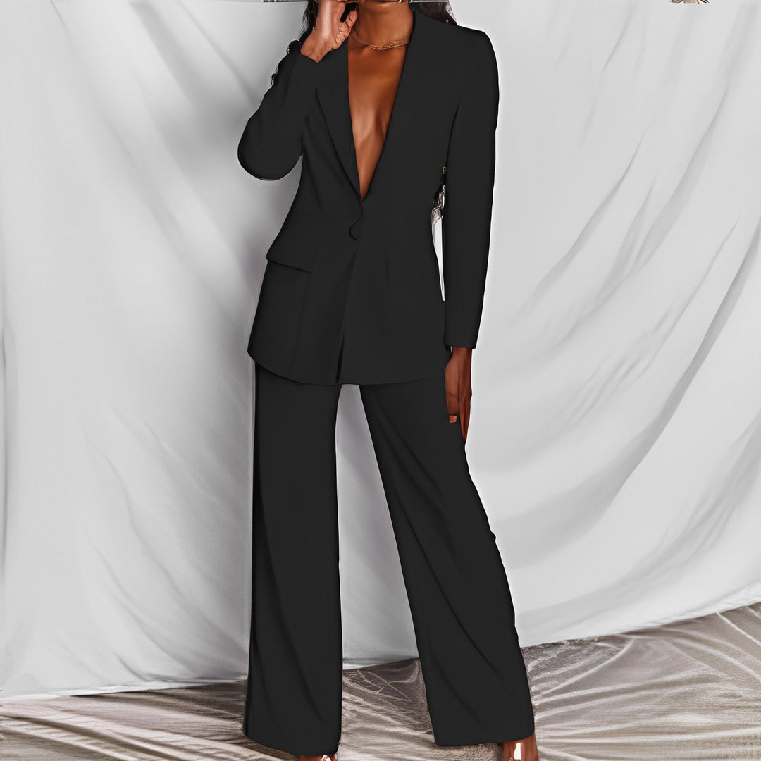 Damen nan eleganter taillierter Zweiteiler mit tiefem V-Revers, Ein-Knopf-Blazer und weiten Bundfaltenhosen Echo Archiv