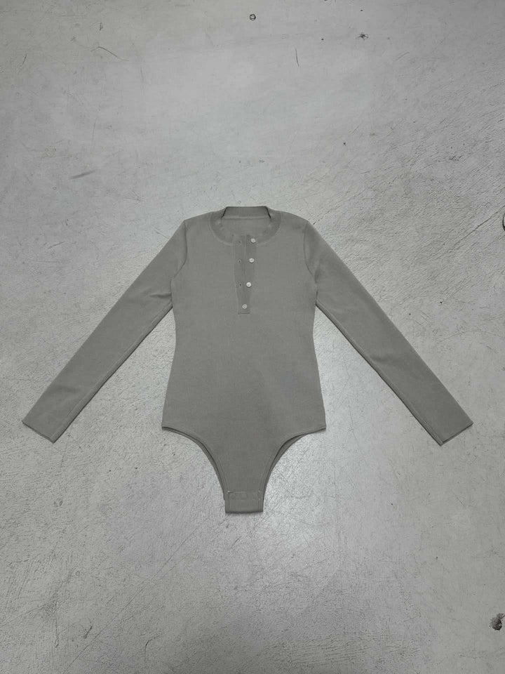 Damen Langarm-Bodysuit mit Knopfleiste und Rippstruktur Echo Archiv