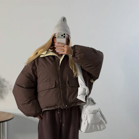 Damen Kurze Oversize Steppjacke mit hohem Kragen und wattierter Fütterung Echoarchiv