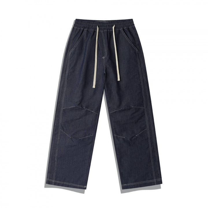 Unisex Weite Denim-Hose mit elastischem Bund, Kordelzug und gesteppter Kniepasse Echo Archiv