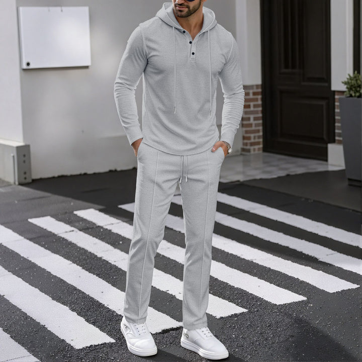 Herren Sportliches Zweiteiler Set mit atmungsaktivem Kapuzenoberteil und schlanker Jogginghose Echoarchiv