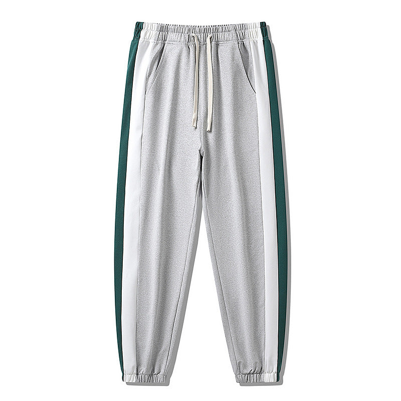 Herren Konische Trackhose mit Kordelzug, seitlichen Colorblock‑Streifen & elastischen Bündchen Echoarchiv