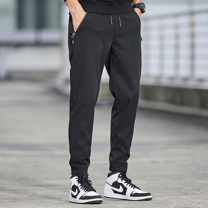 Herren Technische Softshell-Jogginghose mit wasserabweisender Membran, Reißverschlusstaschen und elastischem Kordelbund Echo Archiv