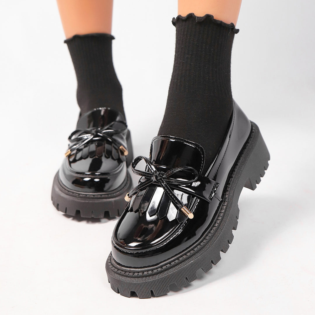Damen  Lackoptik Loafer mit Quastenfransen Zierschleife und robuster Traktorsohle Echo Archiv