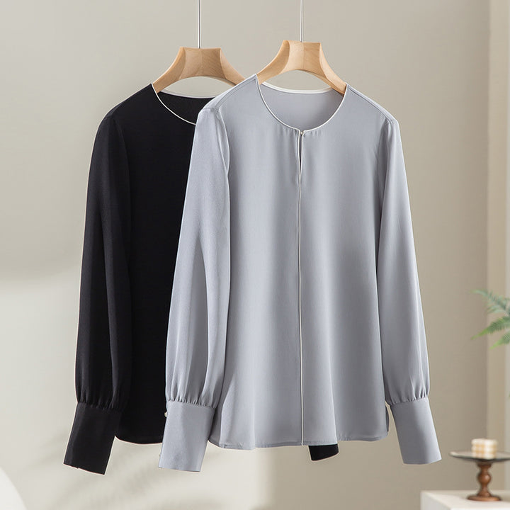 Damen Elegante seidenähnliche Bluse mit Kontrastpaspel und verlängerten Manschetten Echoarchiv