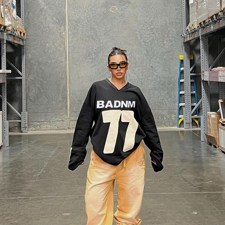 Damen Oversize Sport-Sweatshirt mit V-Ausschnitt und Statement-Print Echo Archiv