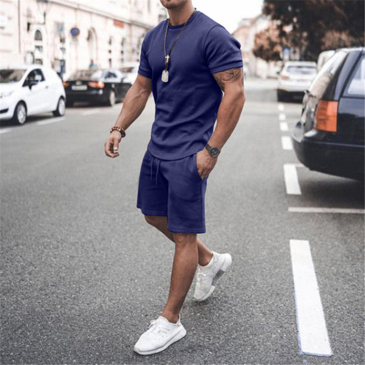 Herren nan figurbetontes Kurzarmshirt mit verstärkter Schulternaht und elastischer Kordelzug-Bermuda aus Stretchjersey Echo Archiv
