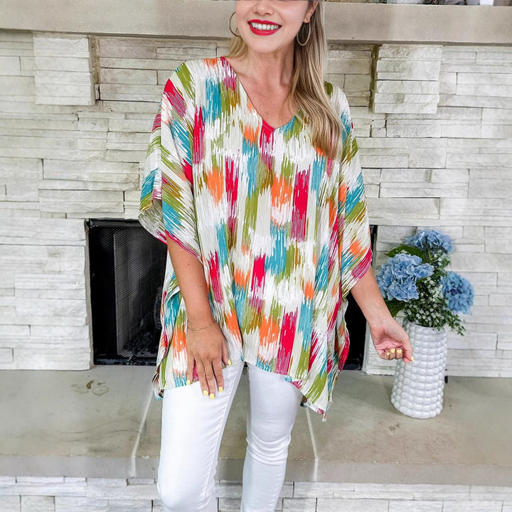 Damen Oversized V‑Neck Tunika im Plissee‑Look mit abstraktem Ikat‑Print – Avérine