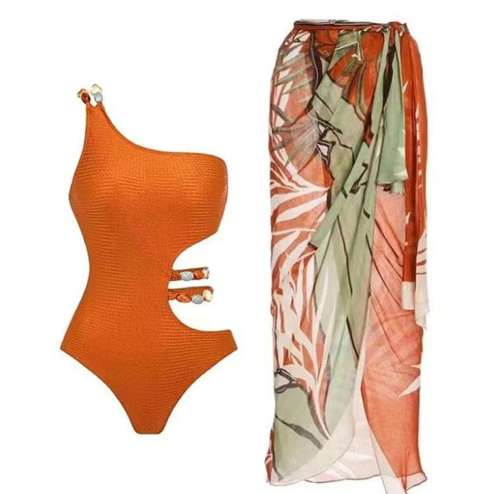 Damen Einteiler Badeanzug mit asymmetrischem Schnitt und floralem Wickelrock Echo Archiv