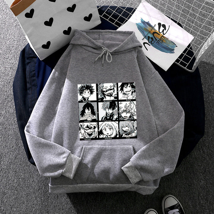 Unisex Kapuzenpullover mit quadratischer Manga-Charakter-Collage, leicht oversizeder Schnitt und Kängurutasche – Auréline